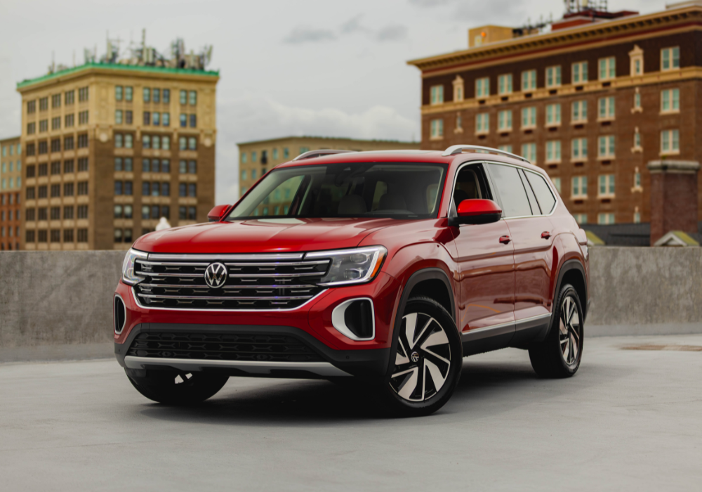New Volkswagen Atlas parked on a rooftop. The SUV is red.