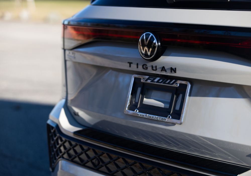 Close up photo of the rear of a white Volkswagen Tiguan for sale 