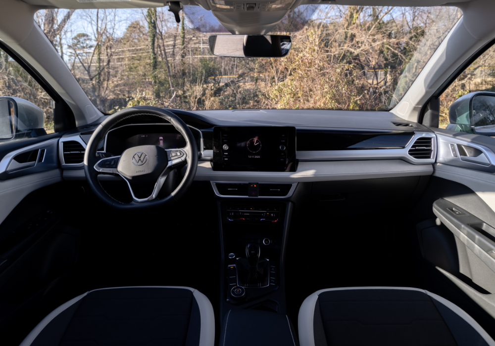 Volkswagen Taos interior comparison with digital cockpit and touchscreen
